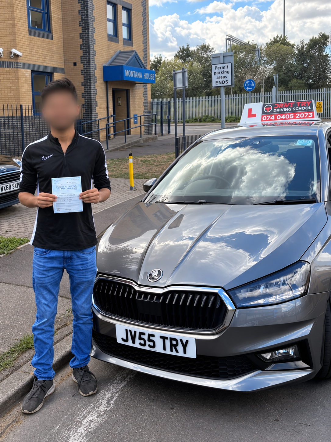 Learner holding their driving test pass certificate
